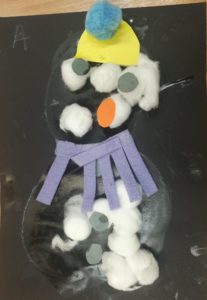 Purple scarf snowman