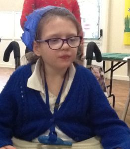 Student with festive hat on at Craig Y Parc School