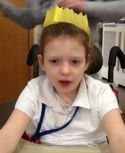 Student with festive hat on at Craig Y Parc School